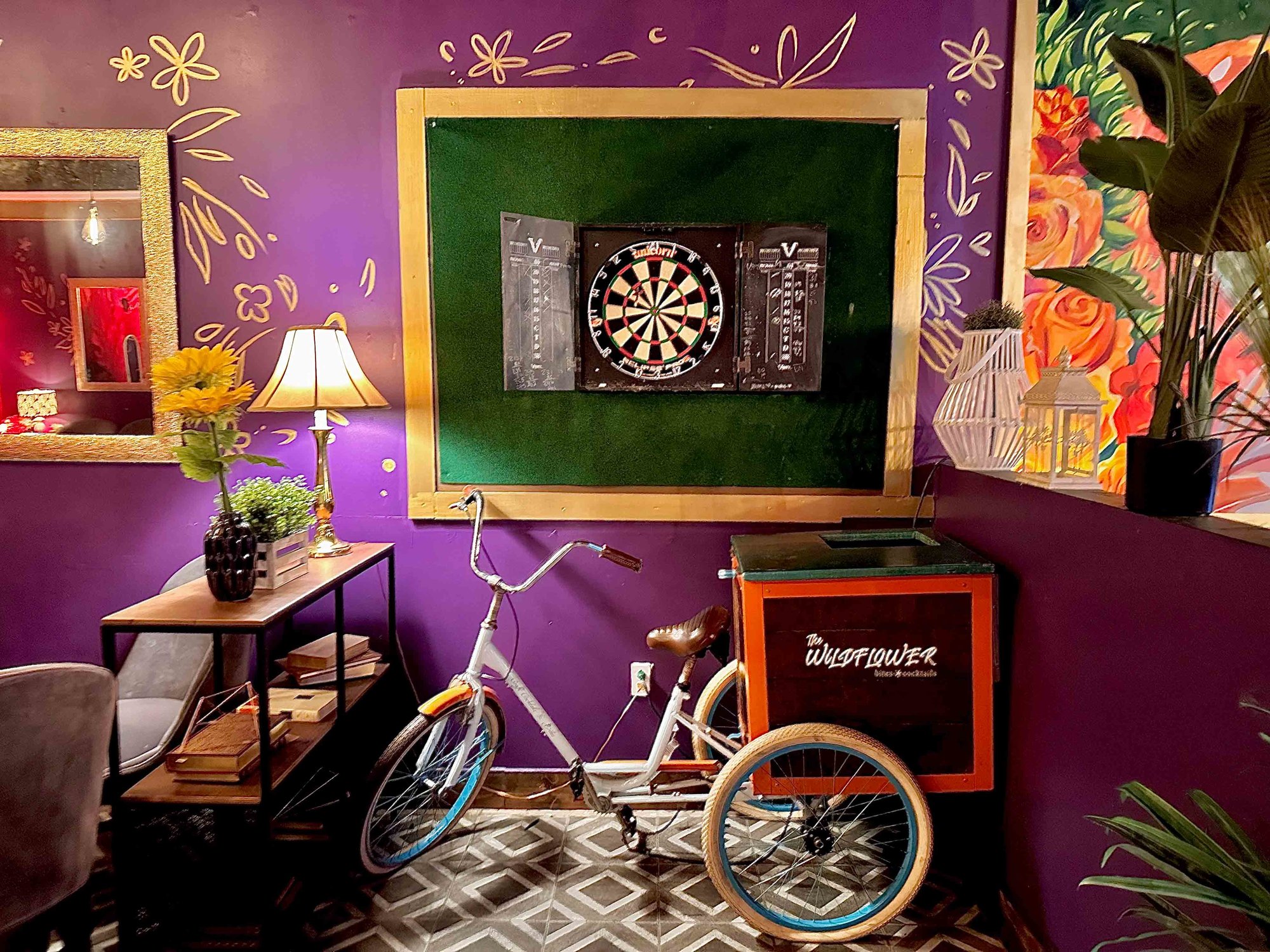 colorful decor with greenery and bike